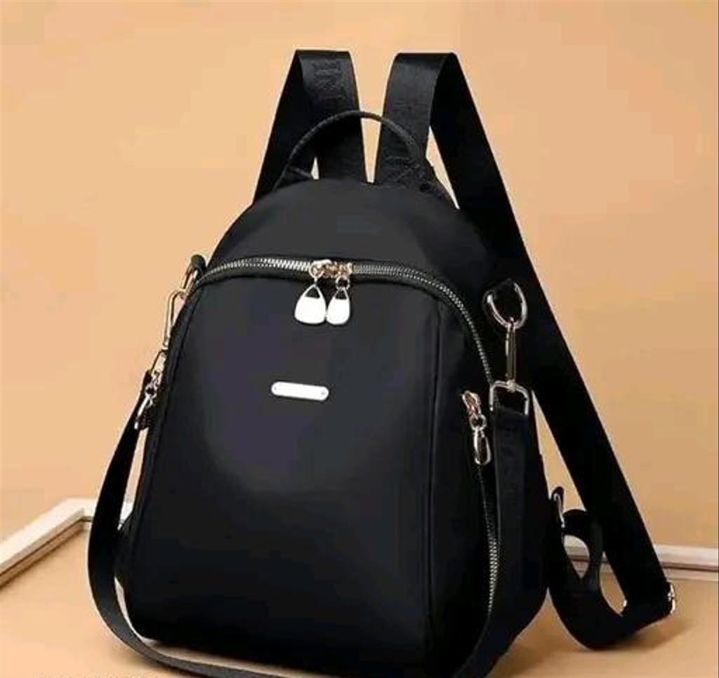 Four-Compartment PU Backpack